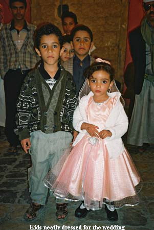 Kids neatly dressed for the wedding