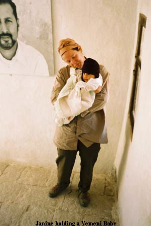 Janine holding a Yemeni Baby